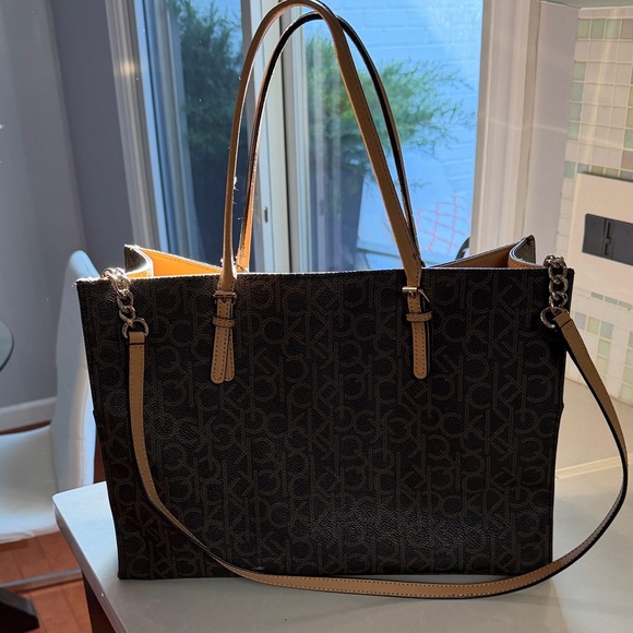 Calvin Klein Handbags - Calvin Klein Black Tote with Tan Trim and Chain Strap